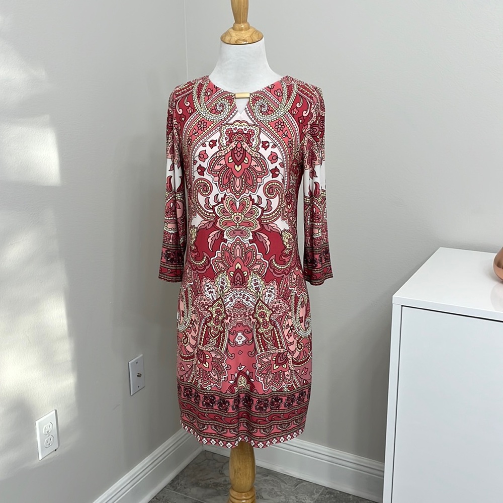 White House black-market pull over sheath dress looks new was too short for me.